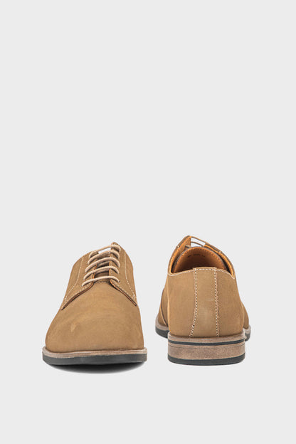 formal shoes sand